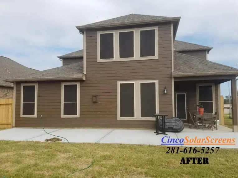 Two-story home with patio area